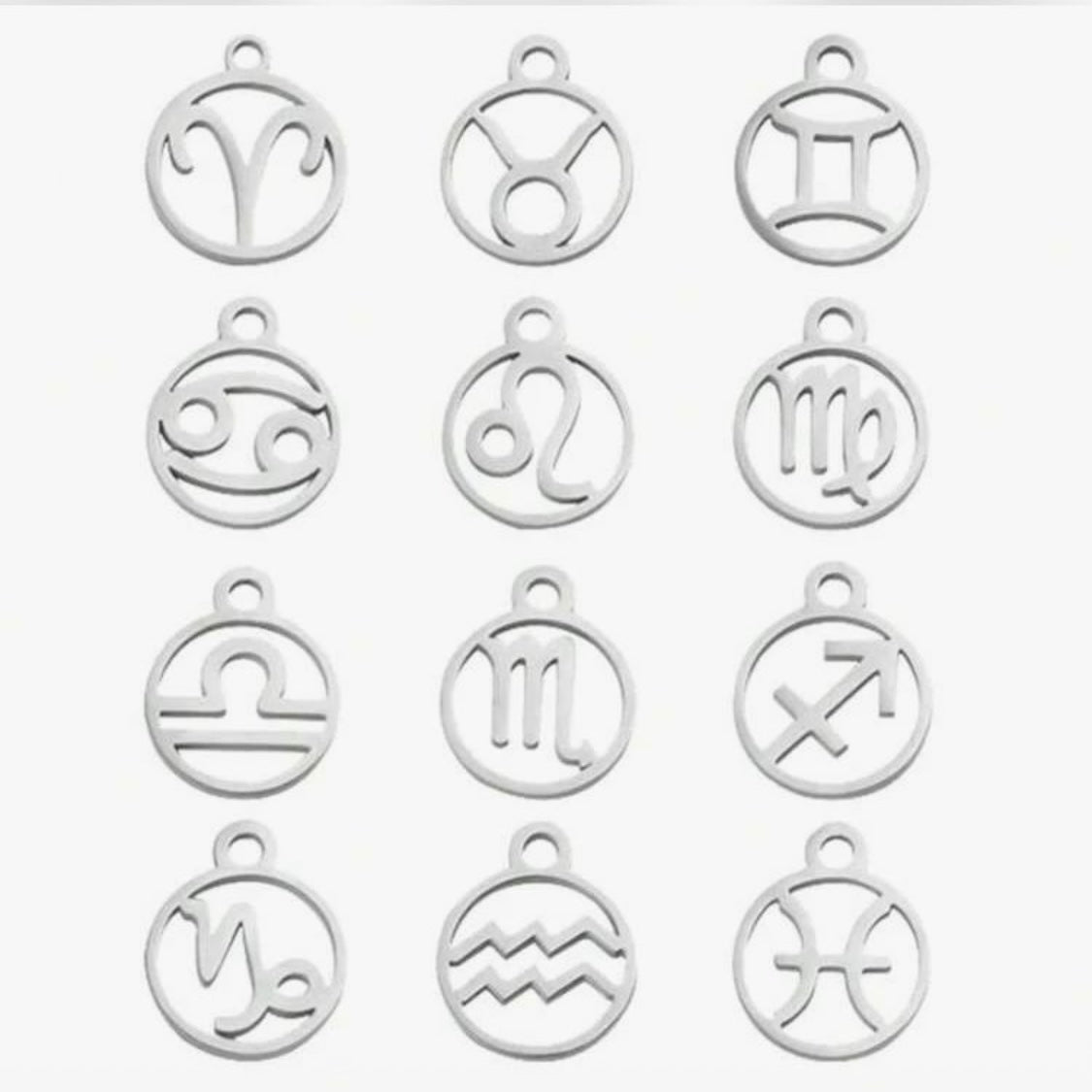 ASTRO • Bague en acier inoxydable avec breloque astro