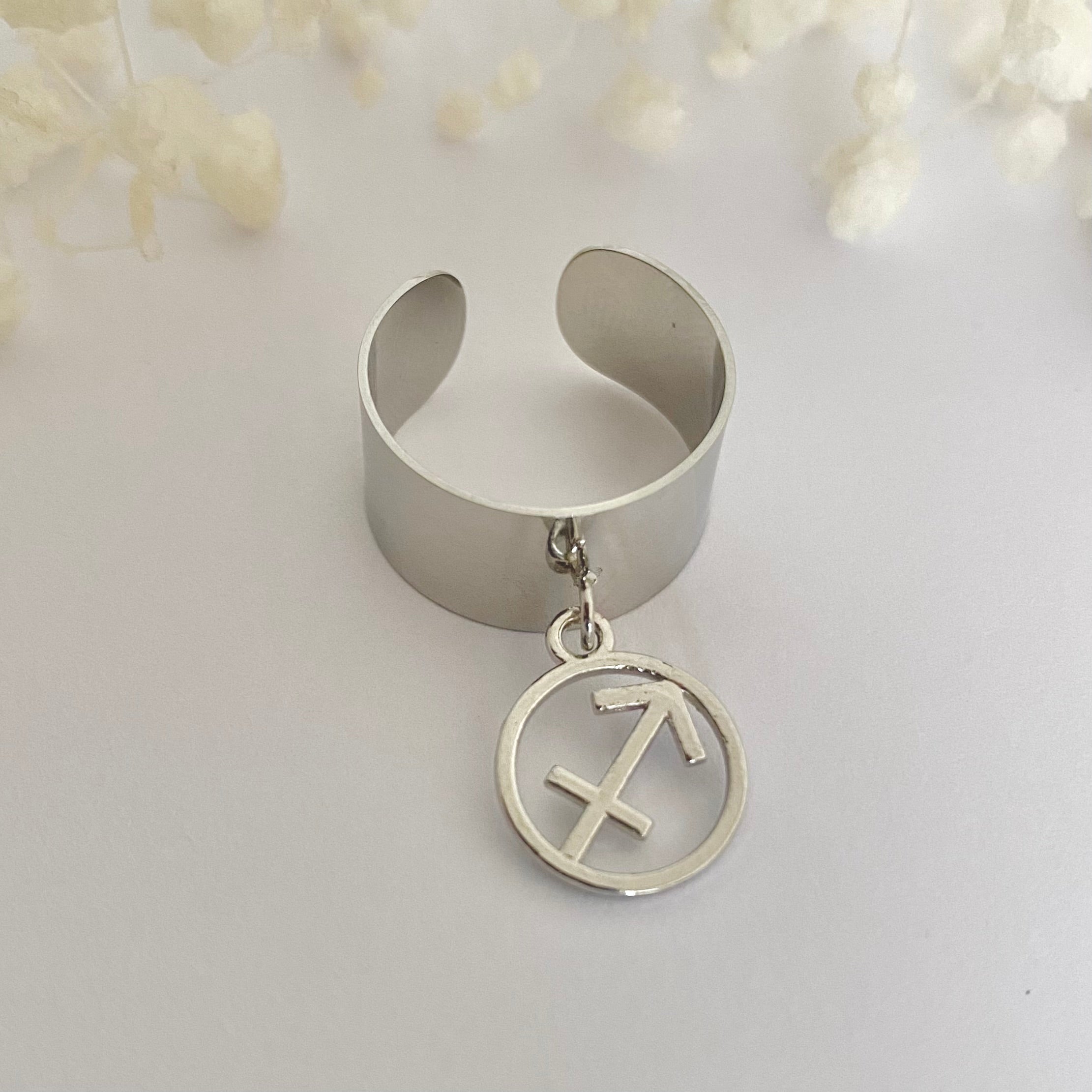 ASTRO • Bague en acier inoxydable avec breloque astro