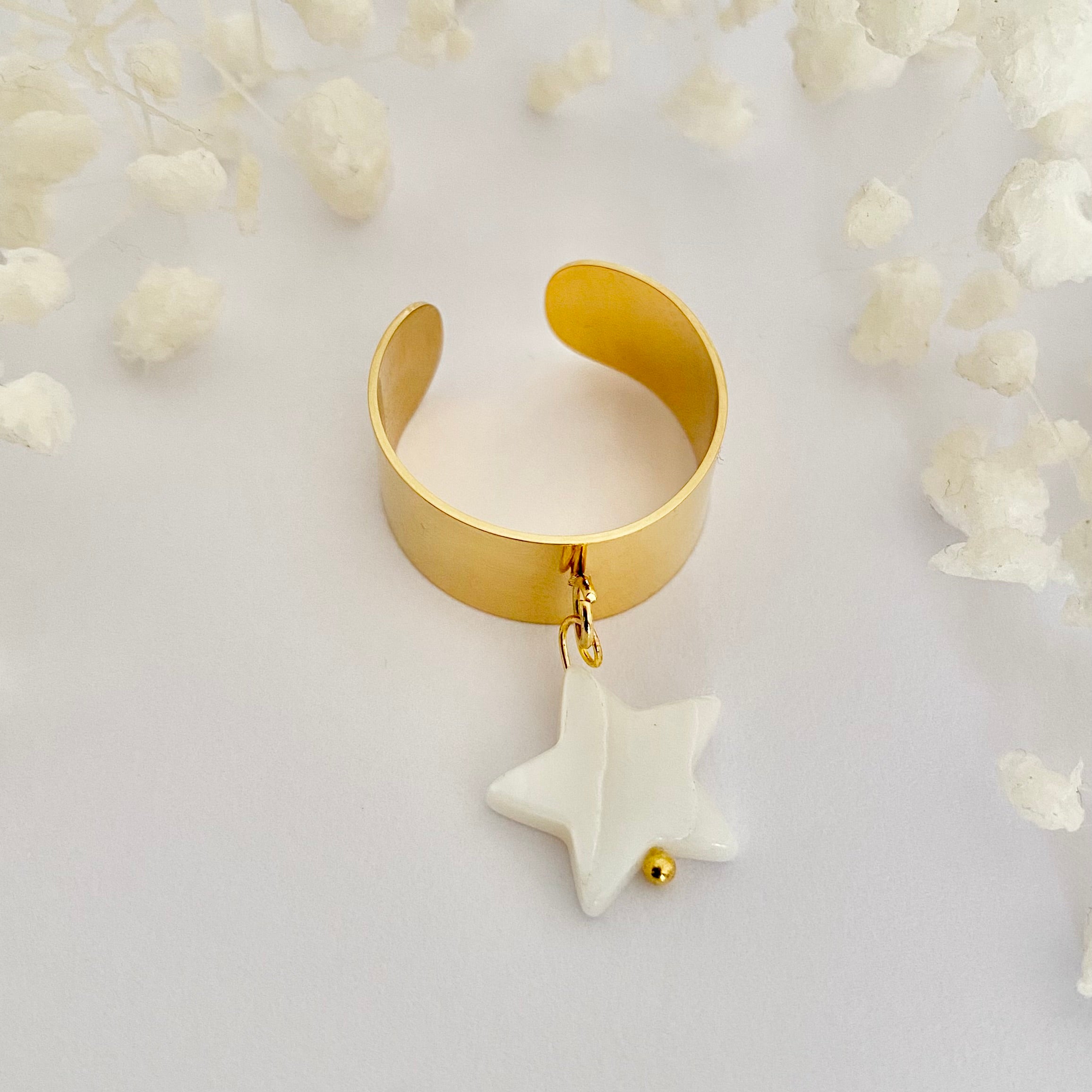 CIEL • Bague en acier inoxydable avec breloque étoile en coquillage