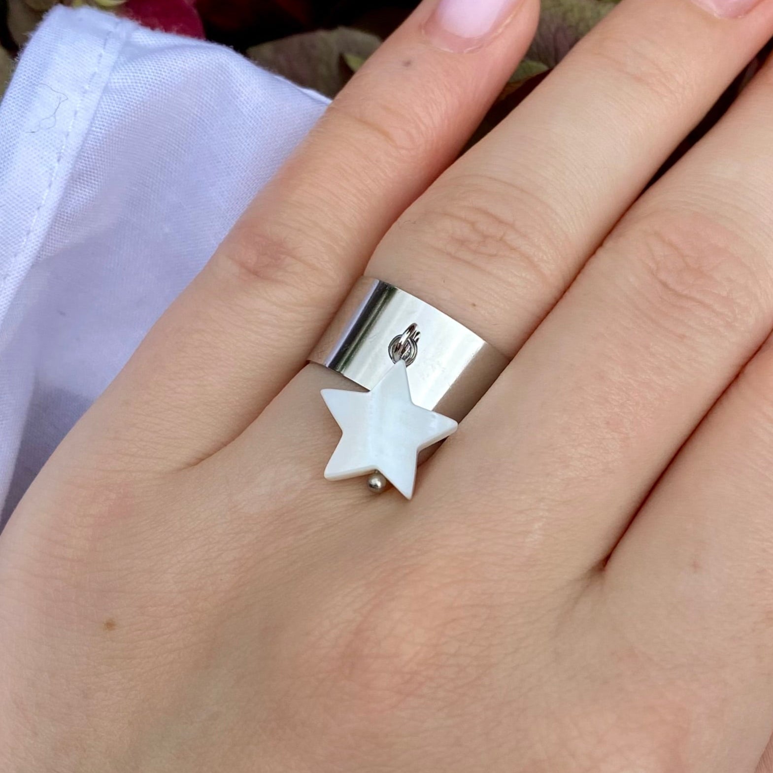 CIEL • Bague en acier inoxydable avec breloque étoile en coquillage