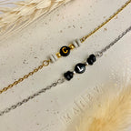 SANA • Bracelet en acier inoxydable avec lettre et perles heishi en céramique