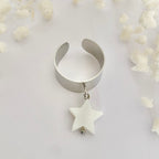 CIEL • Bague en acier inoxydable avec breloque étoile en coquillage